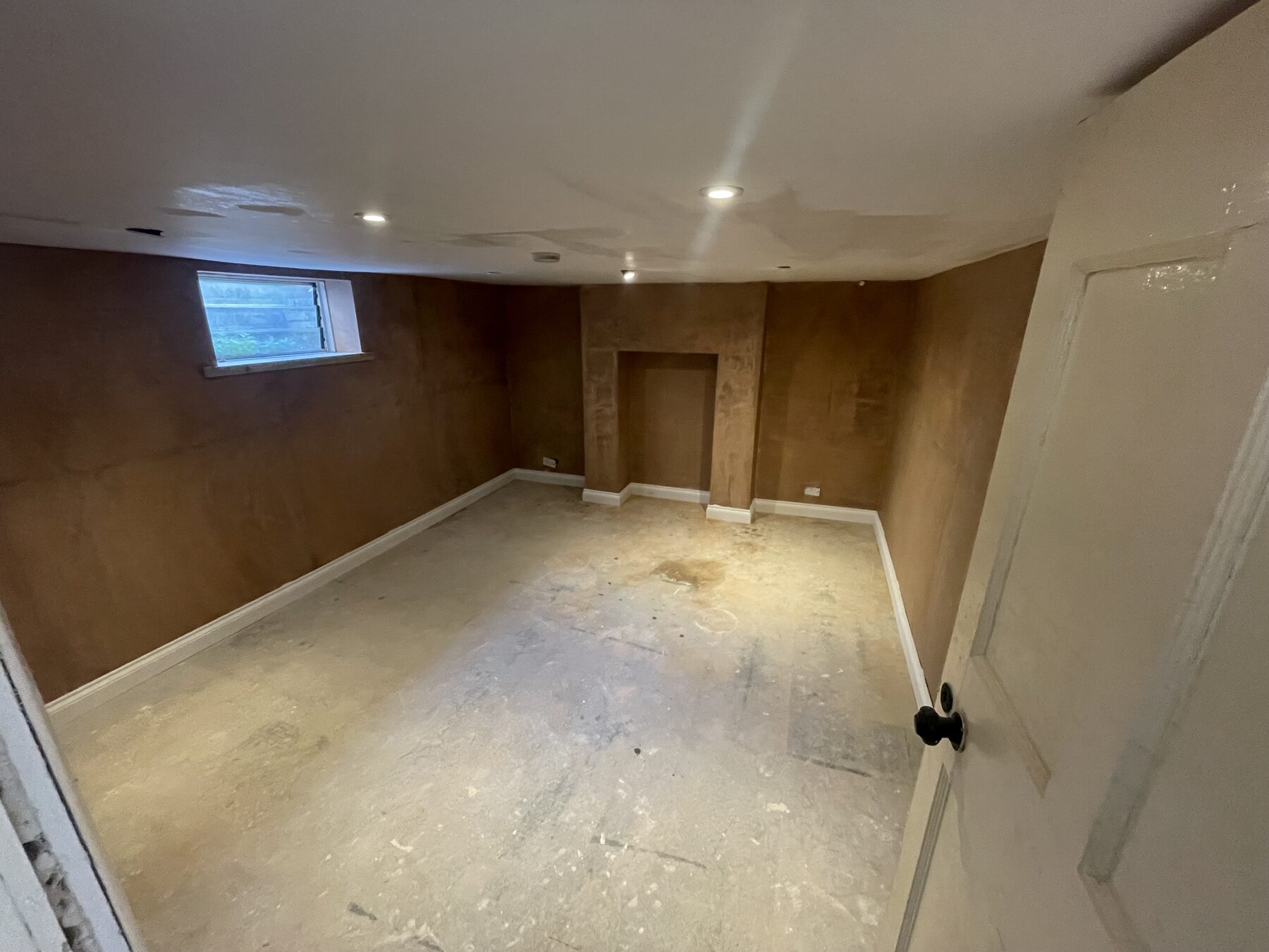 Basement room fully replastered with salt-retardant render system
