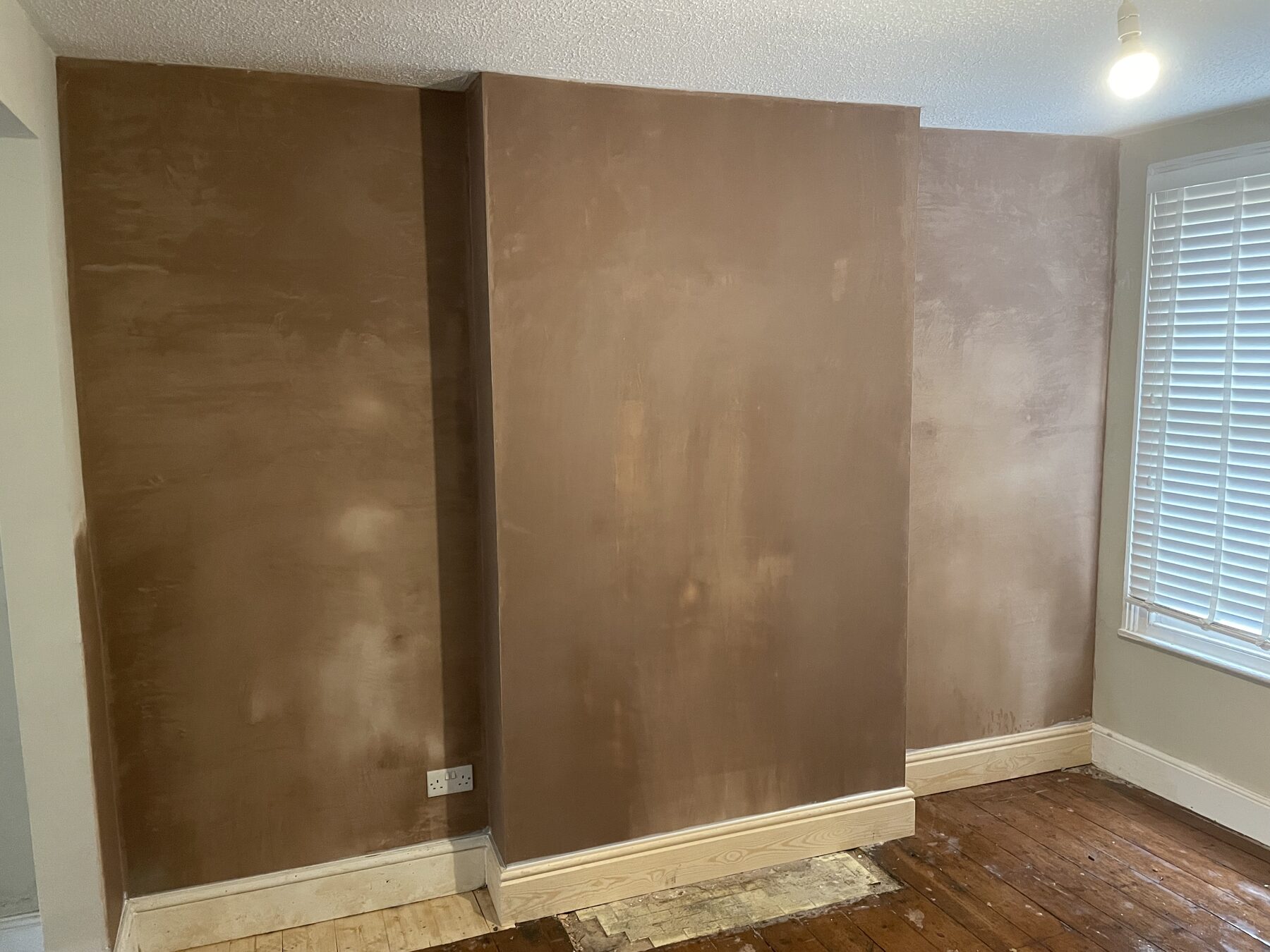 Alcove and chimney breast replastered with specialist damp-proof render