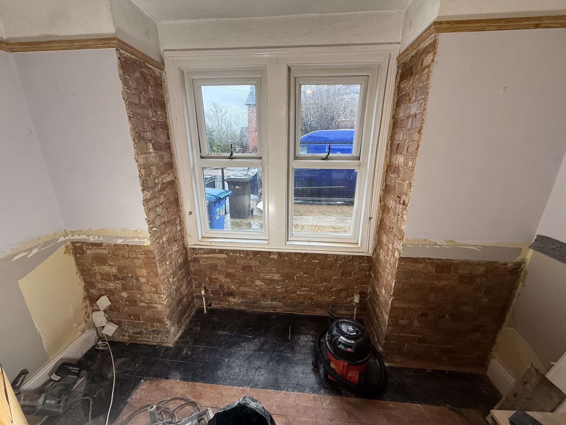 Damp damage to brickwork and plaster