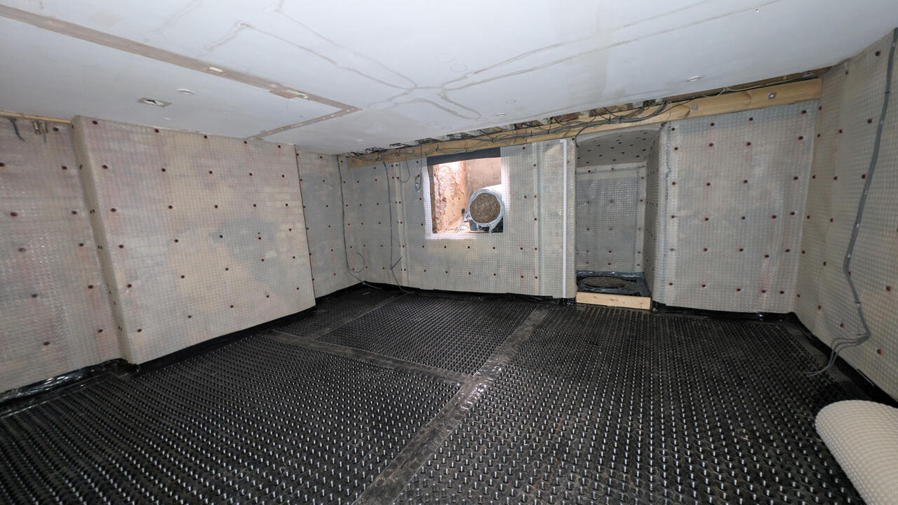 Full basement cavity drain membrane system