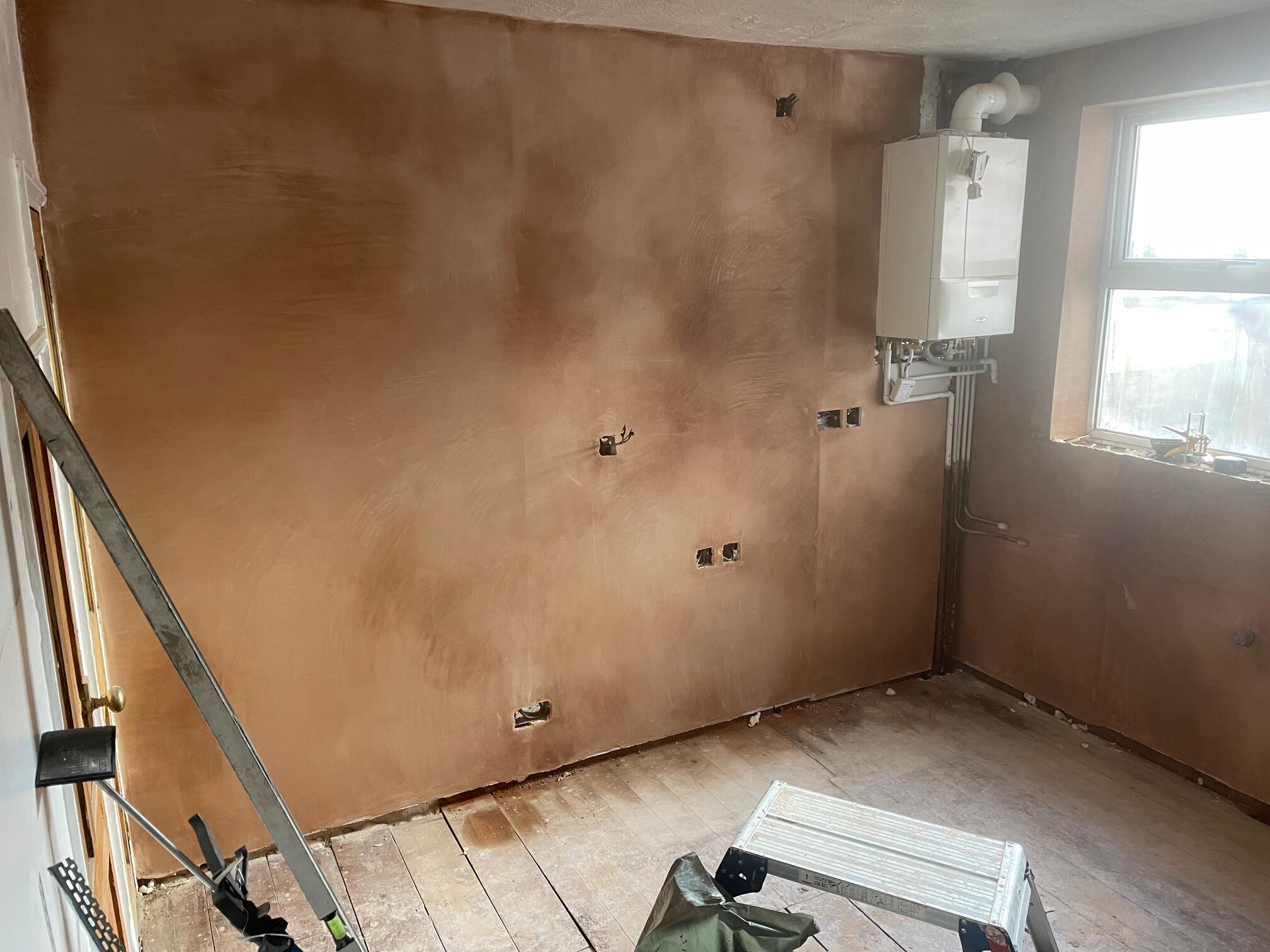 Specialist salt-retardant replastering after rising damp treatment